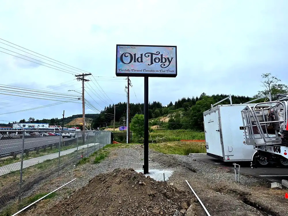 Old Toby illuminated pole sign installed by ESCO Pacific