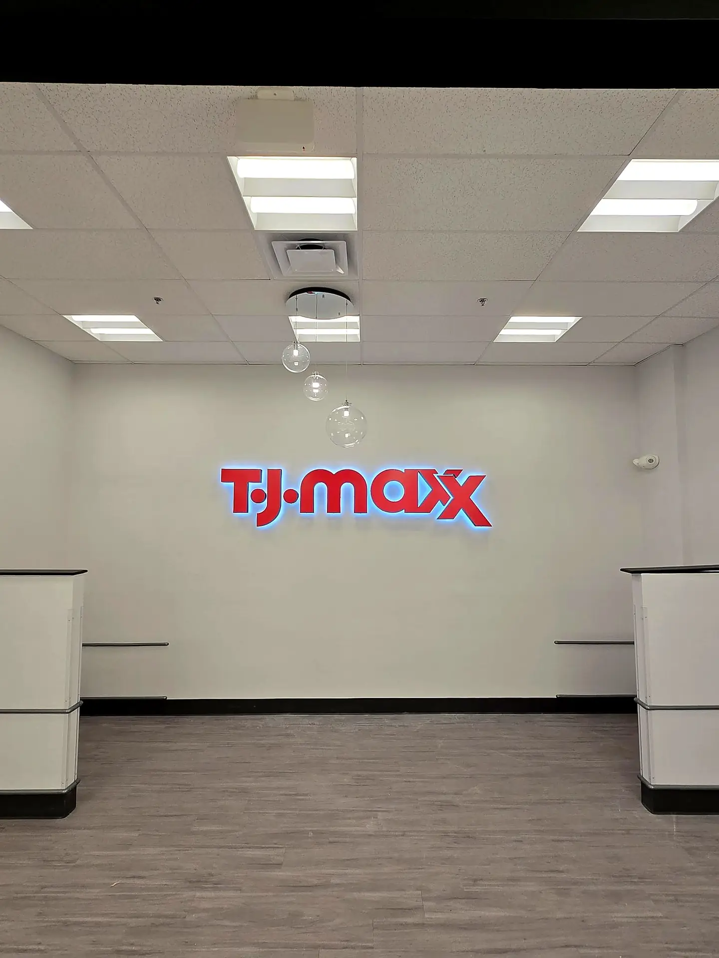 TJ Maxx fitting-room interior signage by ESCO Pacific